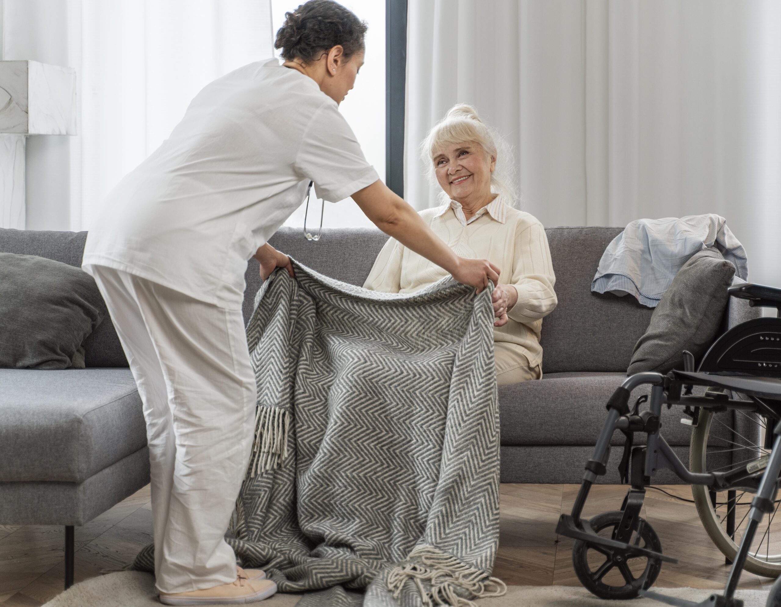 Senior receiving personal care assistance from a certified caregiver through In-Home Care Services in Texas
