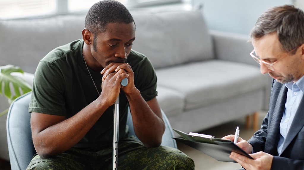 Caregiver engaging in friendly conversation with a senior, part of In-Home Care Services in Texas